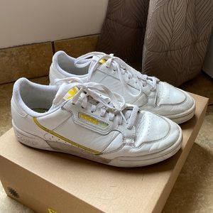 Adidas continentals with yellow detailing